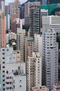 High angle view of buildings in city, hong kong 