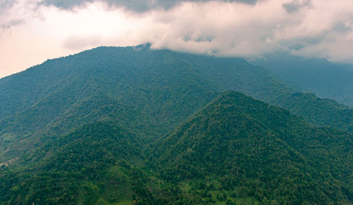 Mountain range with cloudy sky at morning from flat angle