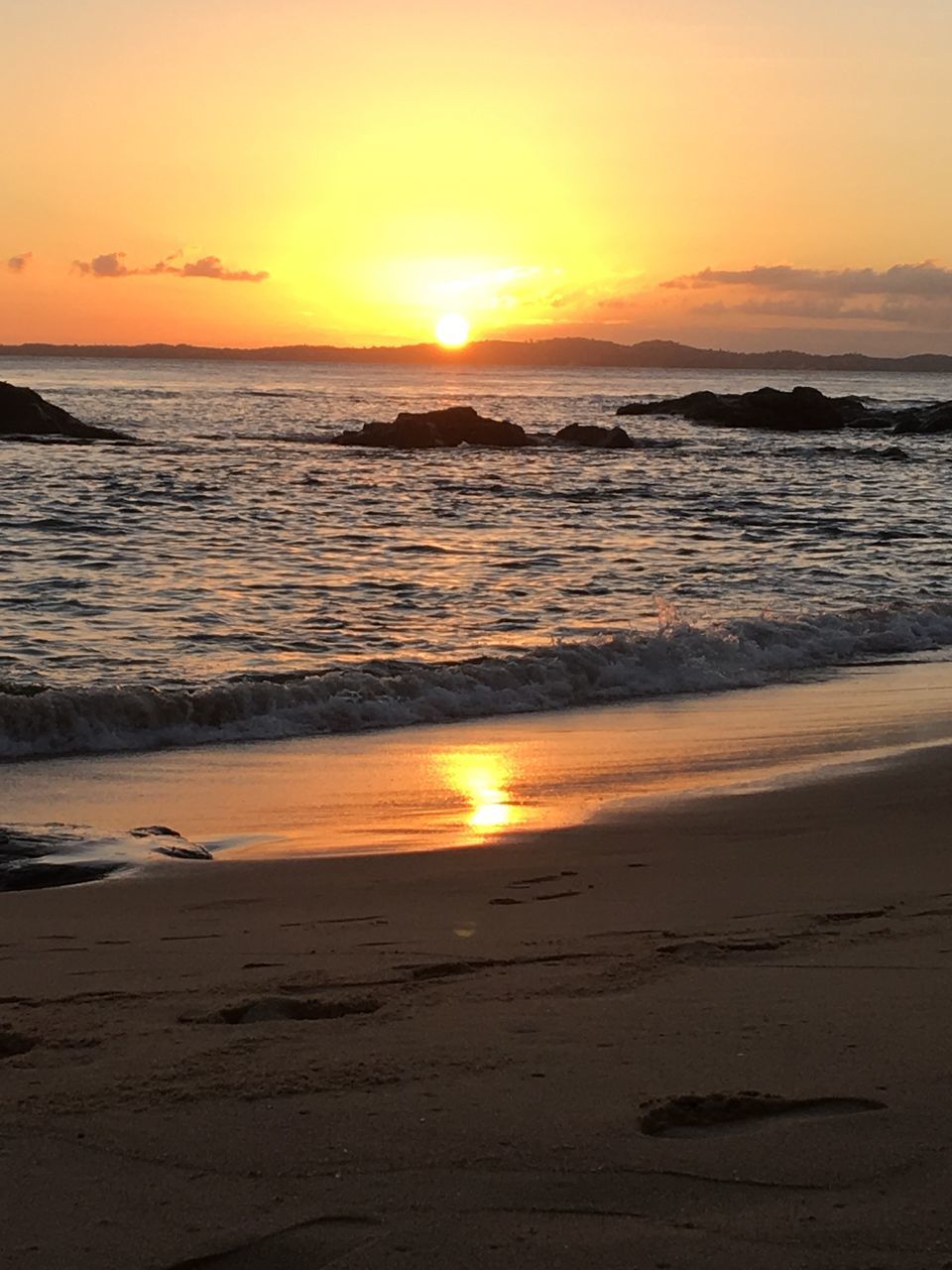 SCENIC VIEW OF SEA AGAINST SUNSET SKY