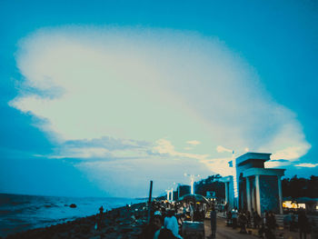 Panoramic view of sea against blue sky