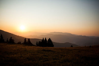 Scenic view of mountains against sky during sunset