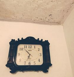 High angle view of clock on wall