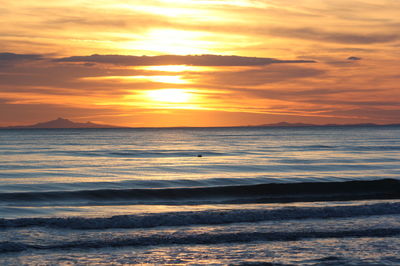 Dramatic sky over sea during sunset