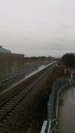 Railroad tracks against sky