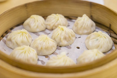 High angle view of food in dumplings in bamboo steamer