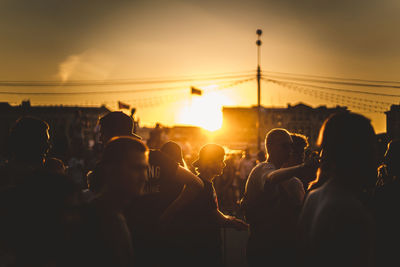 Silhouette of people at night