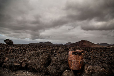 Scenic view of old landscape against sky