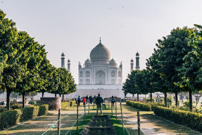 Group of people in front of historical building