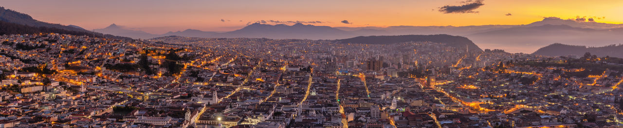 High angle view of buildings against sky during sunset