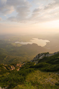 Scenic view of landscape against sky during sunset