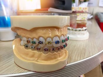 Close-up of dentures on table