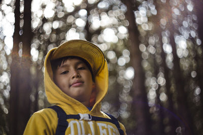Portrait of boy in forest
