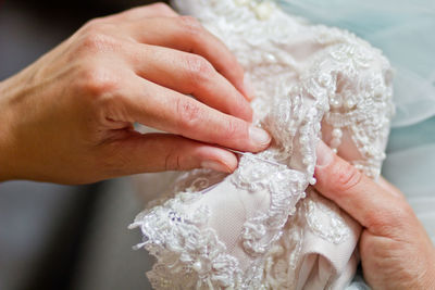 Close-up of woman holding hand