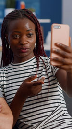 Young woman using mobile phone