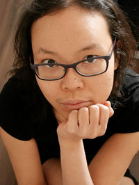 Close-up portrait of young woman