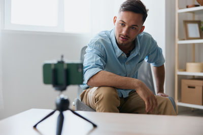 Portrait of man working at home