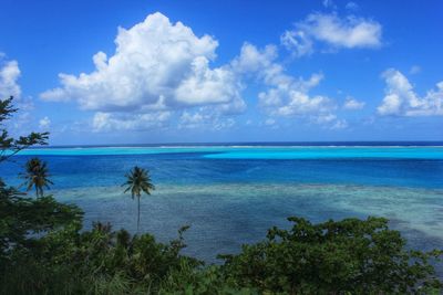 Scenic view of sea against cloudy sky