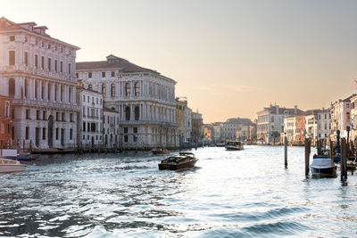 Canals of venice with buildings and boat 