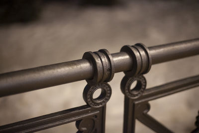 Close-up of chain and railing