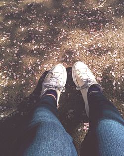 Low section of person standing on ground