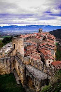 High angle view of old building against sky