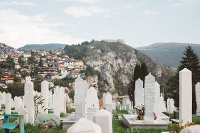 Panoramic view of cemetery against sky