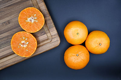 High angle view of orange fruits on table