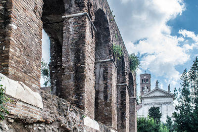 Low angle view of old building against sky