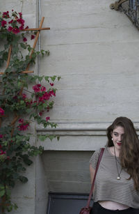 Woman looking at flowers