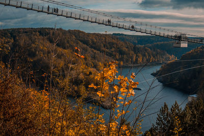 Bridge over river against sky