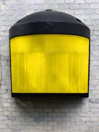 Close-up of yellow brick wall