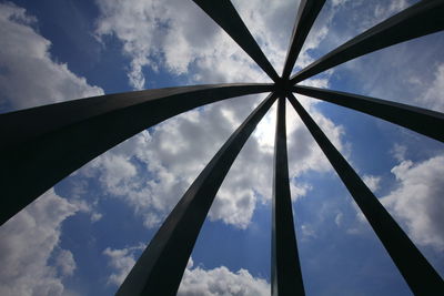 Low angle view of silhouette tower against sky