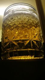 Close-up of glass bottles on table