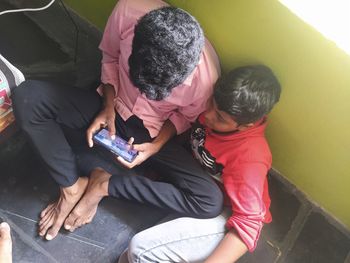 High angle view of people sitting outdoors