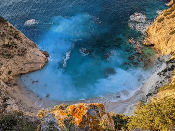 Birdseye cliffside beach view