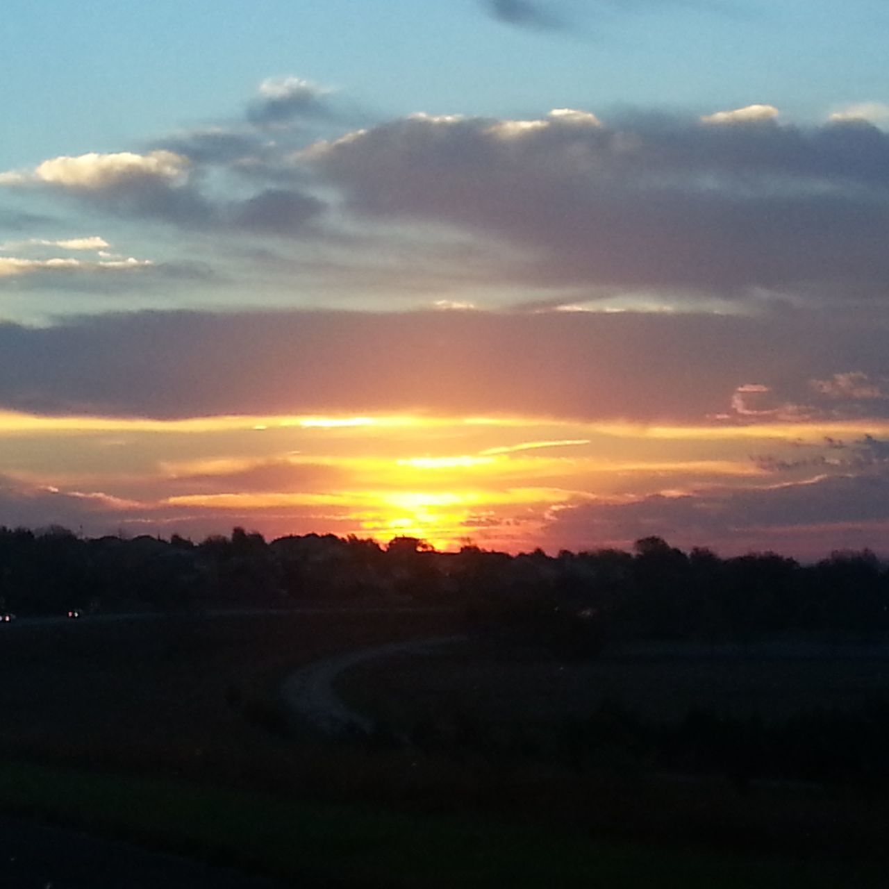 sunset, silhouette, sky, tranquil scene, scenics, tranquility, landscape, orange color, beauty in nature, tree, nature, cloud - sky, idyllic, field, cloud, dark, outdoors, sun, no people, road