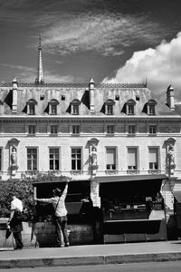 People in front of building