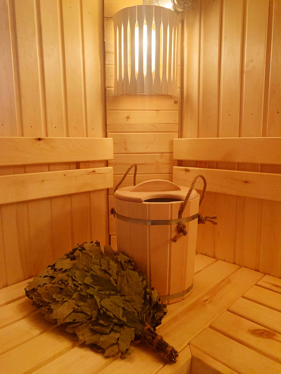 GARBAGE CAN ON WOODEN FLOOR