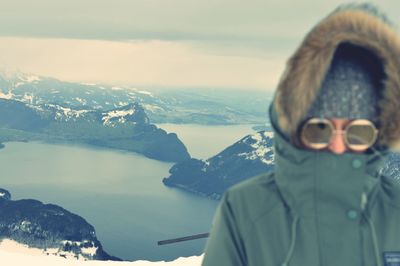 Portrait of man in mountains against sky