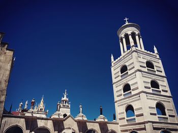 Low angle view of church against clear blue sky