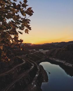 Scenic view of silhouette landscape against clear sky during sunset