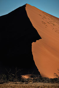 Scenic view of desert against clear sky