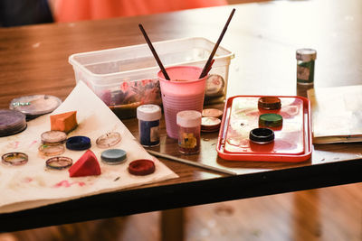 High angle view of paintbrushes on table