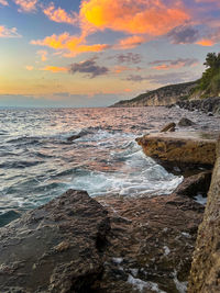 Scenic view of sea against sky during sunset