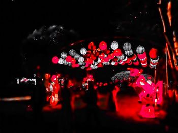 Close-up of illuminated carousel in amusement park