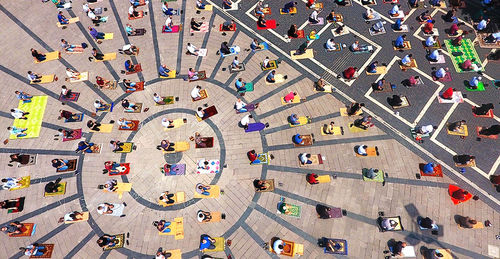 High angle view of people walking in city