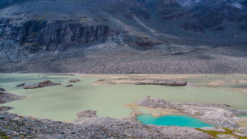 Scenic view of river and mountains