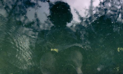 Full frame shot of wet window in rainy season