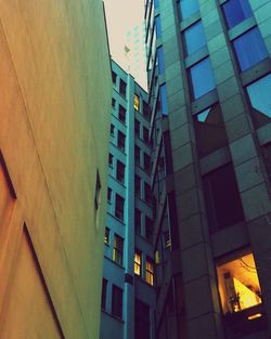 Low angle view of office building against sky