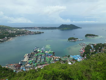 High angle view of plants and sea against sky